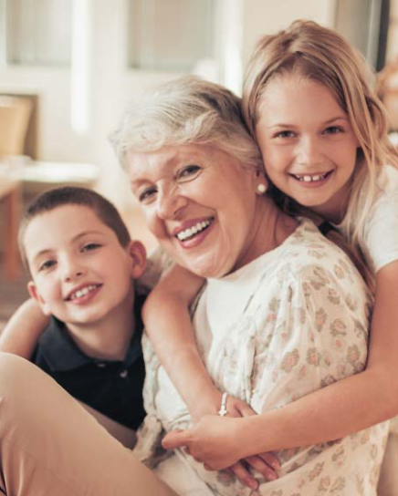 smiling grandmother with grandchildren