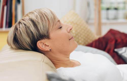 woman relaxing on couch